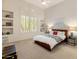 Bright bedroom with a large window, neutral walls, and stylish decor provides a relaxing space at 11490 E Beck Ln, Scottsdale, AZ 85255