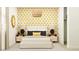 Bright bedroom featuring a queen bed, patterned wallpaper, stylish lamps, and decor at 11946 W Calle De Pompas --, Peoria, AZ 85383