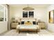 Bright bedroom featuring modern decor, warm natural lighting, and stylish furniture at 11946 W Calle De Pompas --, Peoria, AZ 85383
