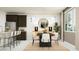 Open concept kitchen and dining area featuring stainless appliances and a natural light-filled space at 11946 W Calle De Pompas --, Peoria, AZ 85383