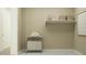 Well-organized laundry room with a washing machine and dryer, ample storage, and functional layout at 11946 W Calle De Pompas --, Peoria, AZ 85383