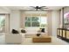 Bright living room features a comfortable sectional sofa, a modern coffee table, and neutral tones at 11946 W Calle De Pompas --, Peoria, AZ 85383