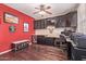 Home office featuring rich dark wood flooring, built-in dark cabinets, and granite counter tops at 12226 W Planada Ln, Sun City, AZ 85373