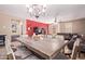 Dining room featuring large dining table, chandelier, and view of the living room at 12226 W Planada Ln, Sun City, AZ 85373