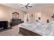 Comfortable main bedroom with private access to a bathroom provides relaxation and privacy at 12226 W Planada Ln, Sun City, AZ 85373