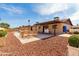 Backyard showcasing a pool, patio, and outdoor dining area at 12241 N 49Th Ave, Glendale, AZ 85304