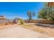 Expansive backyard featuring a storage shed, offering a blend of functionality and outdoor living at 12613 N 51St Dr, Glendale, AZ 85304