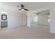 The main bedroom features large mirror closet doors and a view of an en suite bathroom at 12613 N 51St Dr, Glendale, AZ 85304