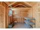 Well-organized storage shed featuring built-in shelving and an air conditioning unit for climate control at 12613 N 51St Dr, Glendale, AZ 85304