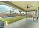 Backyard featuring a pool and grassy lawn at 1383 E Prescott Pl, Chandler, AZ 85249