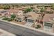 This well-kept home includes desert landscaping in the front yard and a convenient two-car garage at 1383 E Prescott Pl, Chandler, AZ 85249