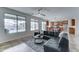 Open-concept living room with views of the pool area, kitchen, and adjacent breakfast nook seating at 1383 E Prescott Pl, Chandler, AZ 85249