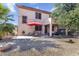 Spacious backyard with patio, outdoor dining, and desert landscaping, perfect for outdoor living at 15241 W Madison St, Goodyear, AZ 85338