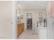 Bright and open bathroom leading to a large closet at 15241 W Madison St, Goodyear, AZ 85338