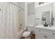 Bright bathroom featuring a shower-tub combination and modern vanity with sleek fixtures at 15488 W Aster Dr, Surprise, AZ 85379