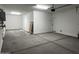 A spacious two-car garage with ample storage space at 17481 W Fulton St, Goodyear, AZ 85338