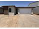 Newly constructed single Gathering home with a two car garage and a brick-accented exterior at 18168 W Larkspur Dr, Goodyear, AZ 85338