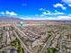 Beautiful aerial image of this community featuring mountain views and well-maintained landscaping at 18495 W Rimrock St, Surprise, AZ 85388