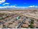 Aerial view of a quiet residential neighborhood, highlighting mountain views, desert landscape, and community layout at 18495 W Rimrock St, Surprise, AZ 85388