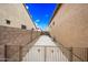 Gated backyard area between homes, providing extra storage and privacy at 18495 W Rimrock St, Surprise, AZ 85388