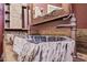 Modern rustic bathroom featuring vessel sinks made of petrified wood at 18495 W Rimrock St, Surprise, AZ 85388