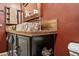 Custom bathroom features tree trunk sinks and a rustic-style vanity at 18495 W Rimrock St, Surprise, AZ 85388