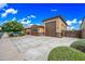 Spacious three-car garage with a large driveway, offering ample parking and convenient access at 18495 W Rimrock St, Surprise, AZ 85388
