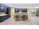 Gourmet kitchen features a beautiful island and stainless steel appliances at 18495 W Rimrock St, Surprise, AZ 85388