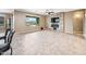 Bright living room with access to the backyard and modern finishes at 18495 W Rimrock St, Surprise, AZ 85388