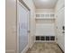 Mudroom featuring custom storage and built in bench at 18495 W Rimrock St, Surprise, AZ 85388