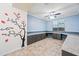 Office/Den space with custom built-ins and desk, designer paint, and a bright, airy feel at 18495 W Rimrock St, Surprise, AZ 85388