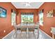 Dining room with three windows offering natural light and backyard views at 20215 N Mariposa Way, Surprise, AZ 85374