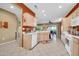 Bright eat-in kitchen with tile floors, and views of the backyard at 20215 N Mariposa Way, Surprise, AZ 85374