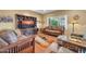 Inviting living space with wooden furniture, hardwood flooring, and a well-lit atmosphere at 20215 N Mariposa Way, Surprise, AZ 85374