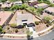 Aerial view of the home features a well-maintained yard with desert landscaping and private yard at 20615 W Daniel Pl, Buckeye, AZ 85396