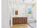 Beautiful bathroom features a double vanity and luxurious glass shower with a built-in bench at 20615 W Daniel Pl, Buckeye, AZ 85396