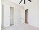 Vacant bedroom with carpeting, closet, and ceiling fan at 20615 W Daniel Pl, Buckeye, AZ 85396