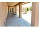 Covered patio showing access to home, pergola and fire pit at 20615 W Daniel Pl, Buckeye, AZ 85396