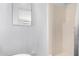 Bright bathroom featuring modern fixtures, decorative trim, and tiled shower at 2064 W 2Nd St, Mesa, AZ 85201