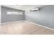 Bedroom with tile flooring, one window and air conditioning unit at 2064 W 2Nd St, Mesa, AZ 85201