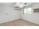 Bedroom featuring an air conditioning unit, ceiling fan, tile floor, and one window at 2064 W 2Nd St, Mesa, AZ 85201