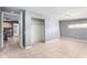 Bedroom features an open closet and access to the kitchen and bathroom at 2064 W 2Nd St, Mesa, AZ 85201