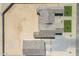 Aerial view of the property showcasing the layout, landscaping, and expansive tile roof at 2087 N 77Th Pl, Mesa, AZ 85207