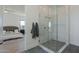 Bright bathroom with a large shower and access to the bedroom at 2087 N 77Th Pl, Mesa, AZ 85207