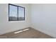 Bright bedroom with a nice view from the large window at 2087 N 77Th Pl, Mesa, AZ 85207