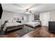 Well-lit bedroom with two beds, providing comfort and style at 2107 E Park Ave, Gilbert, AZ 85234