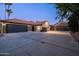 Charming single-story home boasts a three-car garage and meticulously maintained landscaping at 2107 E Park Ave, Gilbert, AZ 85234