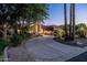 Inviting home exterior featuring a circular drive and desert landscaping at 2107 E Park Ave, Gilbert, AZ 85234