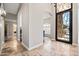 Foyer featuring arched doorways and tile floors at 2107 E Park Ave, Gilbert, AZ 85234