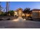 Stunning front entrance featuring custom iron door and stone facade at 2107 E Park Ave, Gilbert, AZ 85234